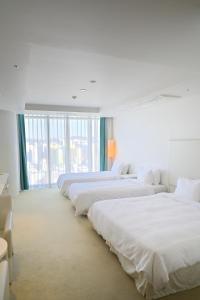 Ecograd Hotel客房内的一张或多张床位