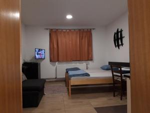 Posteľ alebo postele v izbe v ubytovaní Apartment Eurho