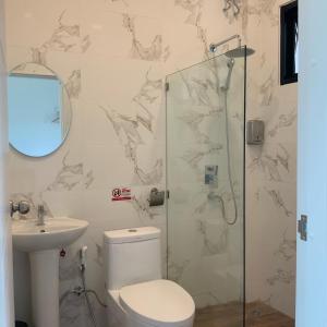 Koupelna v ubytování Saythong boutique hotel
