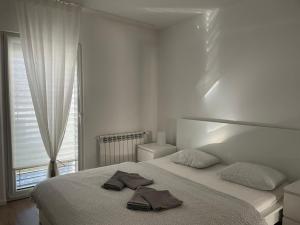 Voodi või voodid majutusasutuse Apartmán v centre Michaloviec toas