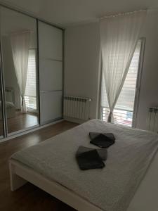 Voodi või voodid majutusasutuse Apartmán v centre Michaloviec toas