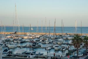 a bunch of boats docked in a harbor at Pestana Cidadela Cascais - Pousada & Art District in Cascais
