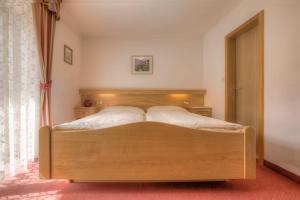 Postel nebo postele na pokoji v ubytování Garni Oskar Appartments