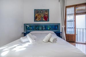 Postel nebo postele na pokoji v ubytování Apartamento con patio cordobés en San Basilio & Parking