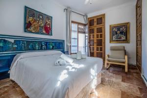 Postel nebo postele na pokoji v ubytování Apartamento con patio cordobés en San Basilio & Parking