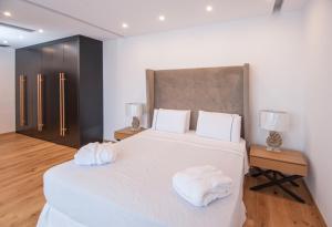 Posteľ alebo postele v izbe v ubytovaní Villa Gina by Elounda Island View Villas