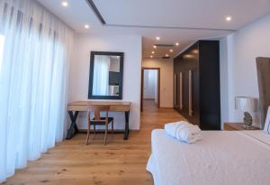 Posteľ alebo postele v izbe v ubytovaní Villa Gina by Elounda Island View Villas