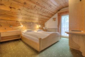 Postel nebo postele na pokoji v ubytování Garni Oskar Appartments