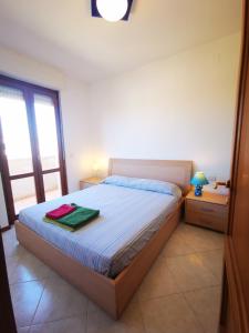 Ένα ή περισσότερα κρεβάτια σε δωμάτιο στο Romantic total sea view