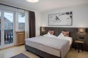 Posteľ alebo postele v izbe v ubytovaní Villa Genziana