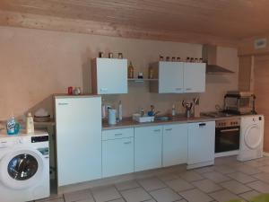 Kuchyň nebo kuchyňský kout v ubytování Ferienwohnung Atlantis