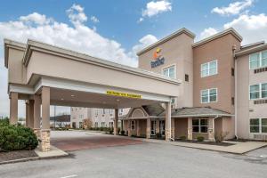 a rendering of a hotel with a parking lot at Comfort Inn & Suites Northern Kentucky in Wilder