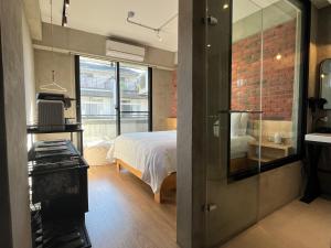 Katil atau katil-katil dalam bilik di 鬧鐘關掉旅店 Alarm Off B&B