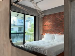 Katil atau katil-katil dalam bilik di 鬧鐘關掉旅店 Alarm Off B&B