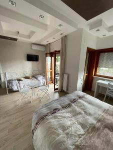 Posteľ alebo postele v izbe v ubytovaní B&B IL CAVALIERE