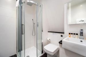 Vonios kambarys apgyvendinimo įstaigoje Apartment 5, 48 Bishopsgate by City Living London
