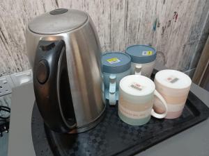 a coffee maker sitting on top of a counter at Saville Cheras Studio Next To Mrt Sri Raya Station in Cheras