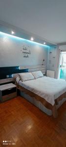 Posteľ alebo postele v izbe v ubytovaní La Casita de Hugo