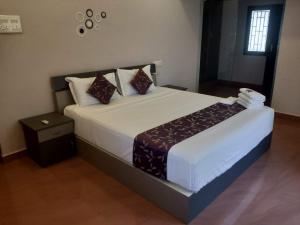 Sremethila Homestay客房内的一张或多张床位