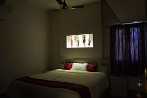 Sremethila Homestay客房内的一张或多张床位