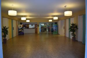 Lobby o reception area sa Hosteria Villa Santa Clara del Atuel