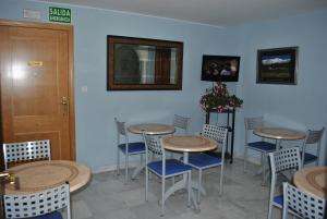 TV a/nebo společenská místnost v ubytování Hotel Albero