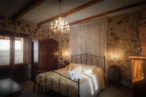Postel nebo postele na pokoji v ubytování B&B La Voce del Fiume Dimora storica di Charme