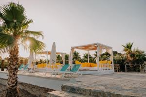 The swimming pool at or close to RAW BEACH HOTEL
