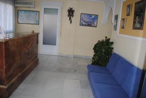 TV a/nebo společenská místnost v ubytování Hotel Albero