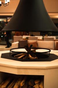 A seating area at RAW BEACH HOTEL