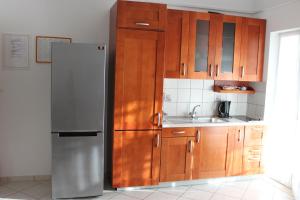 Kuchyň nebo kuchyňský kout v ubytování Pile Apartments 6