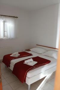 Postel nebo postele na pokoji v ubytování Pile Apartments 6