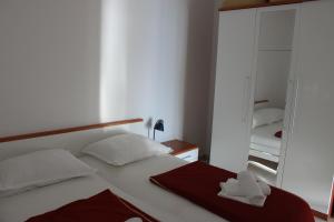 Postel nebo postele na pokoji v ubytování Pile Apartments 6