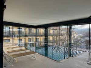 Bazén v ubytování Hotel Garni Colora nebo v jeho okolí