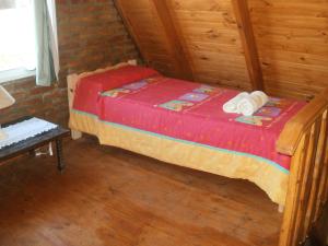 
Una cama o camas en una habitación de Cabañas Mirador del Cerro
