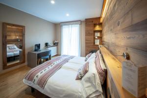 Voodi või voodid majutusasutuse Albergo San Carlo toas