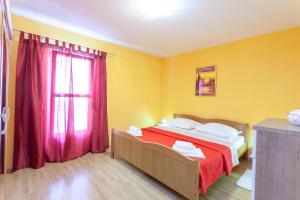 Posteľ alebo postele v izbe v ubytovaní Apartman Prlić 3