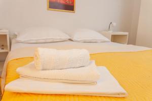Posteľ alebo postele v izbe v ubytovaní Apartman Prlić 3