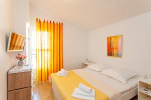 Posteľ alebo postele v izbe v ubytovaní Apartman Prlić 3