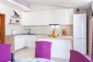 Kuchyňa alebo kuchynka v ubytovaní Apartman Prlić 3