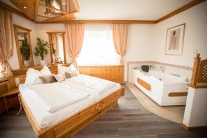 Postel nebo postele na pokoji v ubytování Pension Knoll