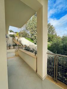 an open balcony with a view of a skate park at Casa Serra in Porto Palo +37 photos