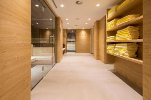 a walkway in a store with wooden shelves at ... mein romantisches Hotel Toalstock in Fiss