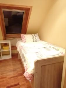 A bed or beds in a room at Ático Anllóns