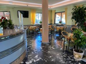 A restaurant or other place to eat at Hotel Moresco