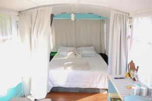 Postel nebo postele na pokoji v ubytování Combi Bus Dreamcatcher