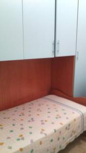 A bed or beds in a room at Fronte del Porto