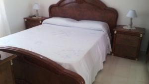 A bed or beds in a room at Fronte del Porto