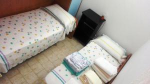 A bed or beds in a room at Fronte del Porto