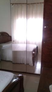 A bed or beds in a room at Fronte del Porto